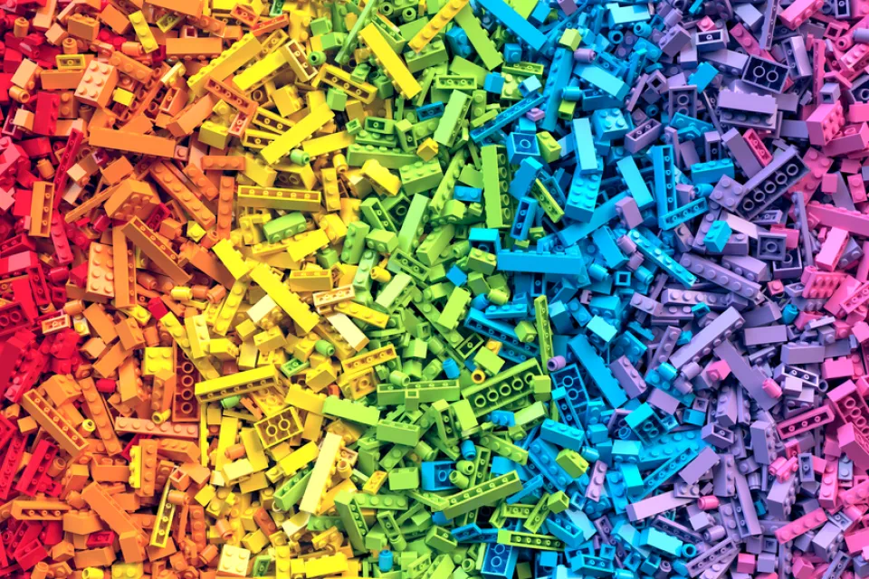 Pile of Lego bricks lined up by color